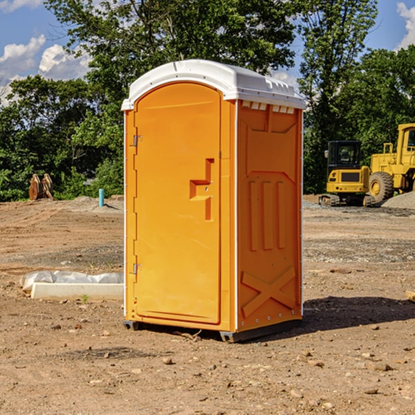 how often are the porta potties cleaned and serviced during a rental period in Krain